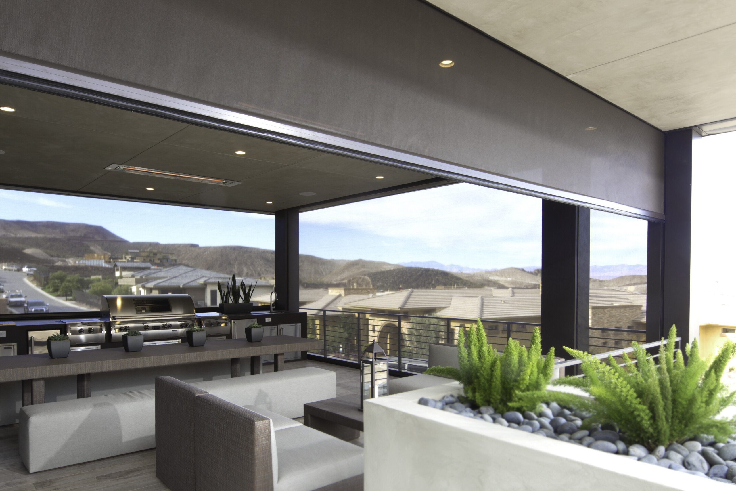 Grilling on the patio with Phantom Motorized Screens